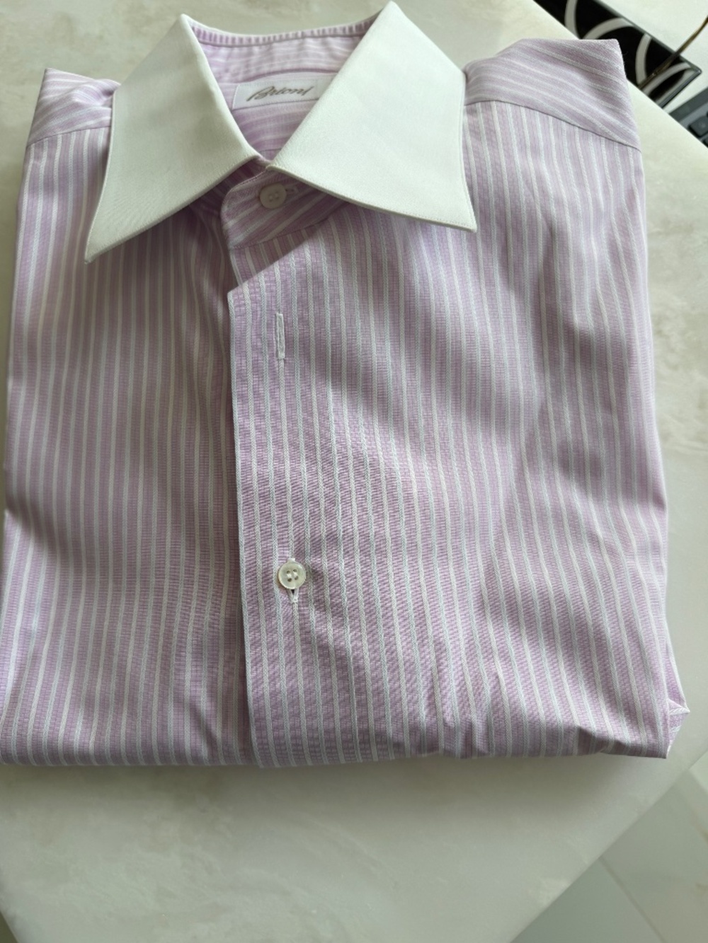 Man’s pink and white Brioni shirt with white French cuffs. Size 17/43